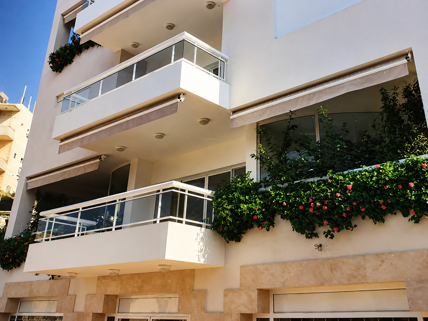 Glass balcony railings on a residential building.